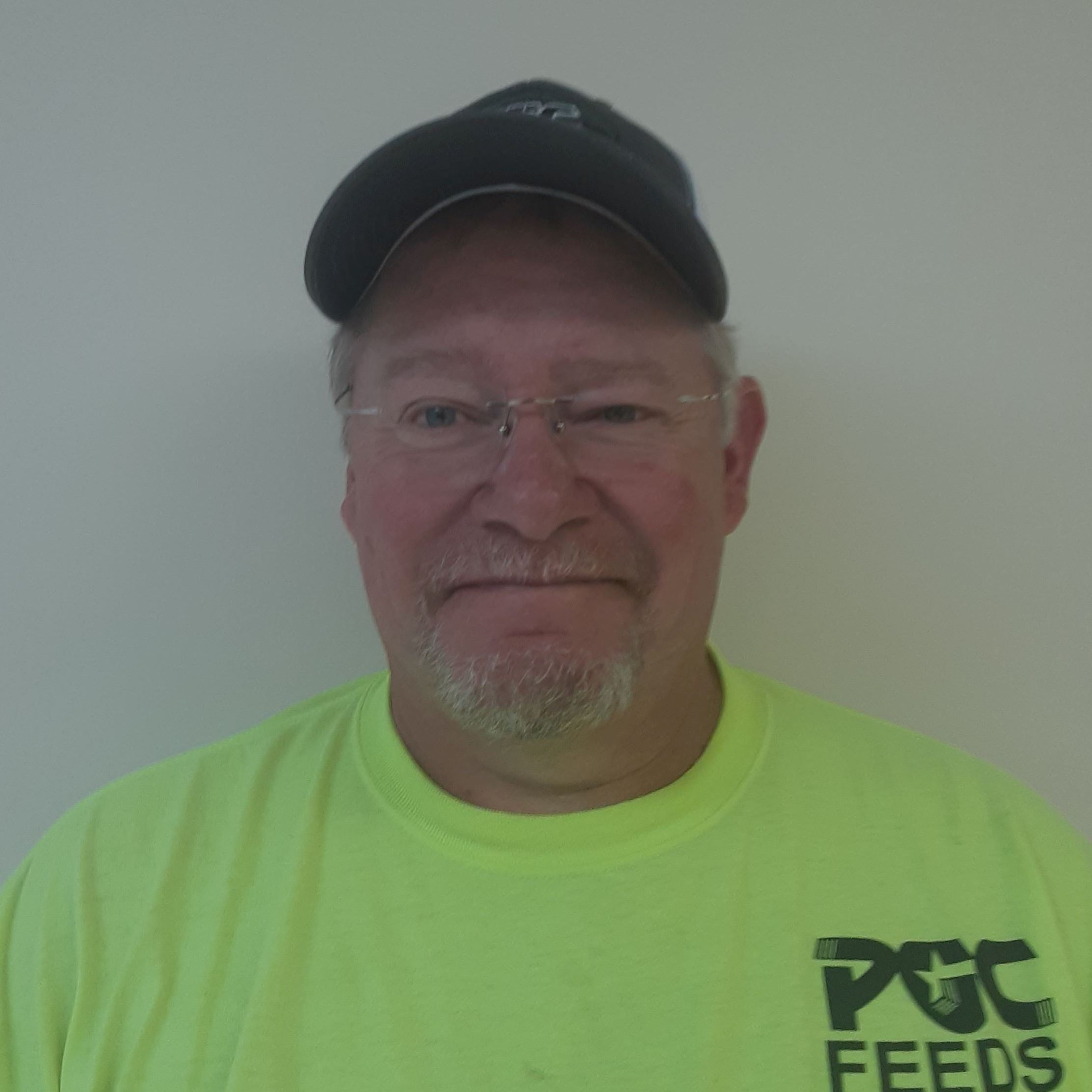 man, smiling, sitting