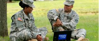 Army Soliders Sitting Down
